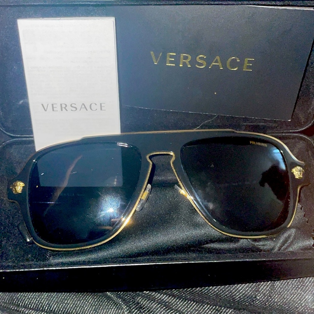 Versace glasses  come with glasses cleaner and box